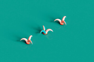 three colorful clown hats