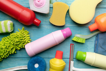 House cleaning plastic product on wood blue table background, home service or housekeeping concept