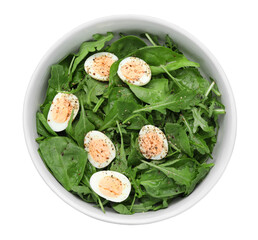 Delicious salad with boiled eggs and herbs in bowl isolated on white, top view