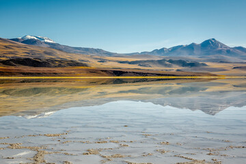 Laguna Tuyajto, salt lake in Atacama desert, volcanic landscape, Chile