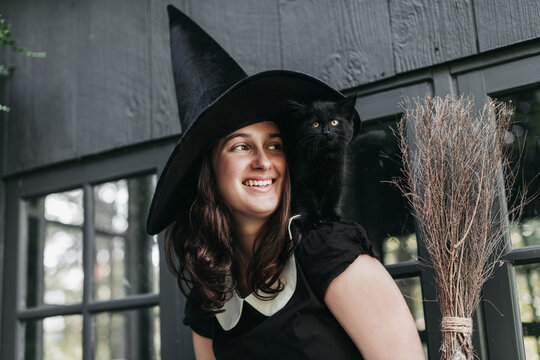 Witch and her halloween kitty.