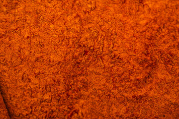  Empty orange fabric background of soft and smooth textile material