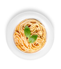 Spaghetti pasta with tomatoes and parsley on  table.