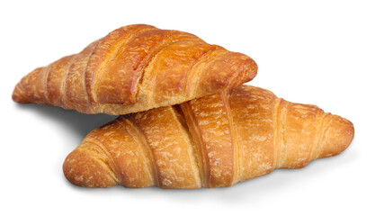 Fresh and tasty croissants over white background