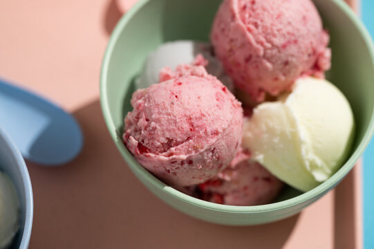 Vanilla and raspberry ice cream dessert in bowls