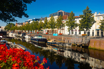 Picturesque view of houses, streets and river at Breda town at sunny day, Netherlands, province of...
