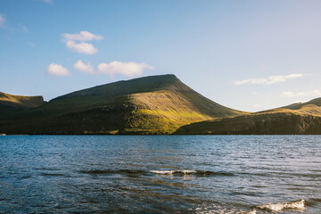 Faroe Islands coastal landscape at sunset