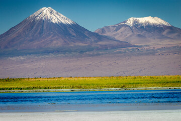 Licancabur volcanic landscape and salt lake reflection in Atacama Desert, Chile