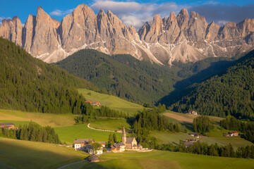 St. Magdalena with famous church in Val di Funes at sunset, Dolomites , Italy