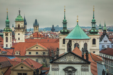 Fototapeta na wymiar Above medieval Prague old town towers and domes at evening, Czech