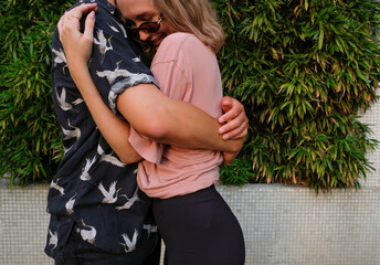 Cropped Image of Two Young People Hugging