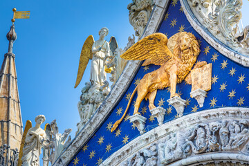 St Mark Basilica facade detail, with lion and angels, Venice, Italy © Aide