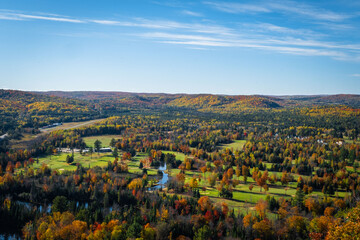 Bird's eye view lookout over fall color trees and golf course in Bancroft, Ontario, Canada
