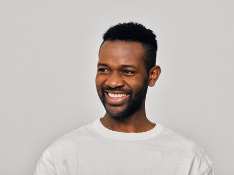 Man in white t-shirt smiling 