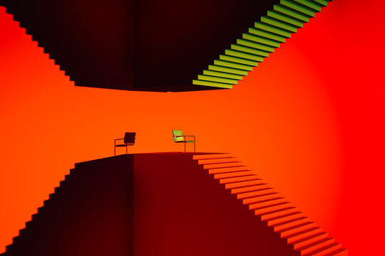 Chair on some stairs surrounded by red walls