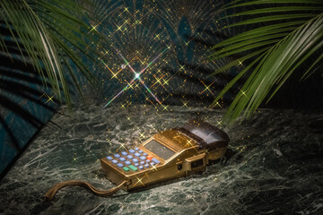 golden pos-terminal with golden sparkling dust in art deco style