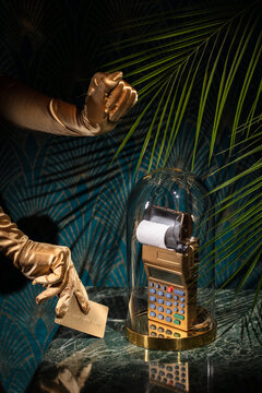 Conceptual still life about expensive purchases with a gold card