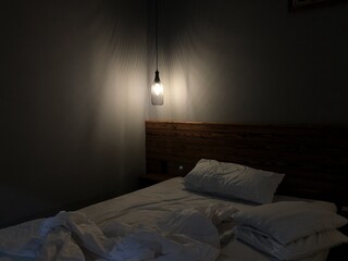 Light illuminating a bedroom