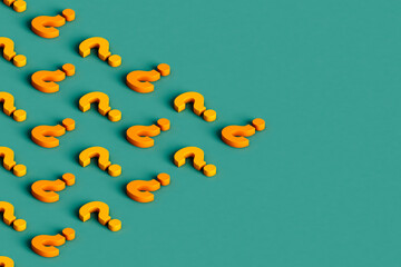 triangle of yellow question marks
