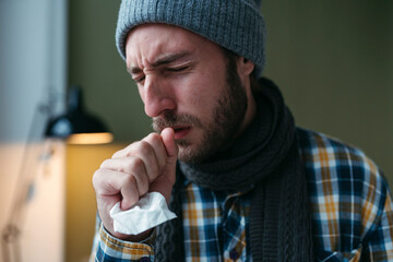 Man with cold coughs.