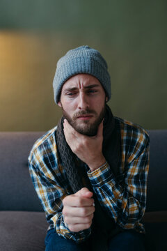 Man with sick throat.