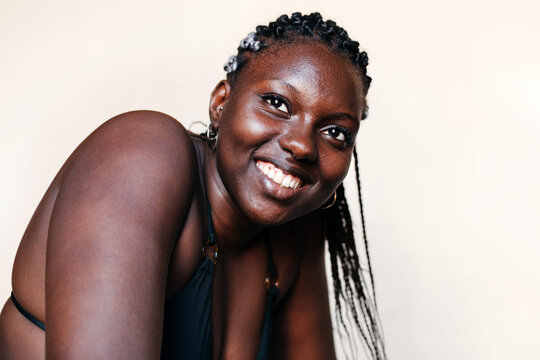 Close up portrait of smiling black woman