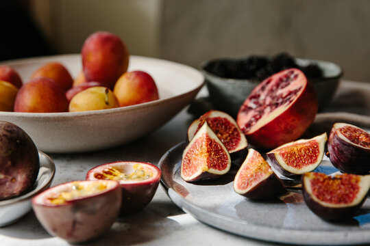 Fresh figs, pomegranate and passion fruit. 