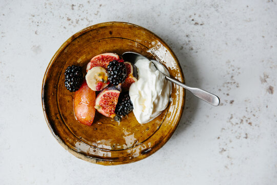 Fresh autumnal fruit and thick yoghurt