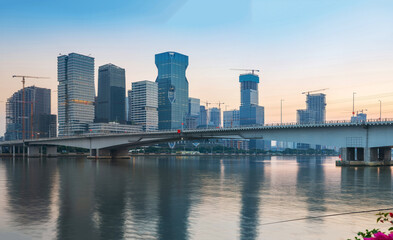 Fototapeta na wymiar Modern urban architecture skyline, bridge and river scenery in Guangzhou, China