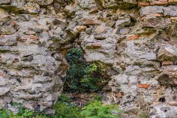 Interior stone and brick wall of castle ruins