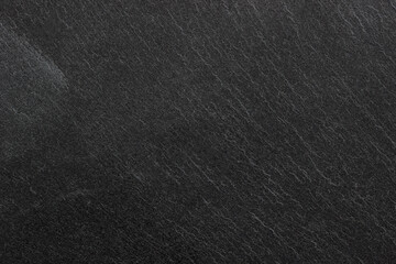 Dark grey black slate background or texture.