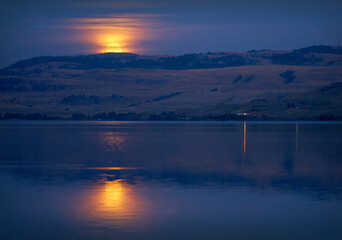 Full Moon over Nicola Lake British Columbia. The full moon rising over Nicola Lake near Merritt. British Columbia, Canada.

