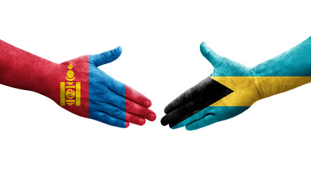 Handshake between Bahamas and Mongolia flags painted on hands, isolated transparent image.