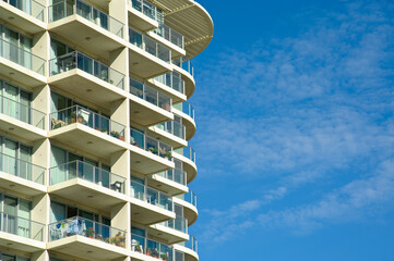 Modern apartments against blue background sky