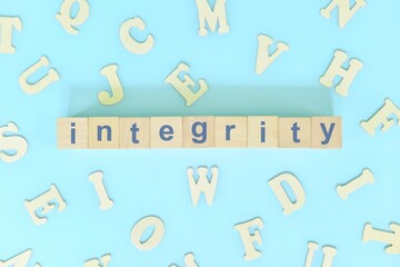 Integrity core values concept in business, company and organization. Word typography on wooden...