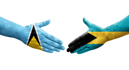 Handshake between Bahamas and Saint Lucia flags painted on hands, isolated transparent image.