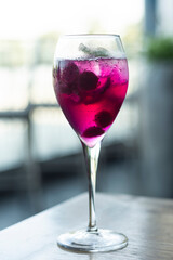 raspberry and red dragon fruit prosecco wine spritzer cocktail
