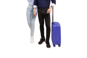 Male and female traveler holding hands happily walking with blue suitcase with transparent background
