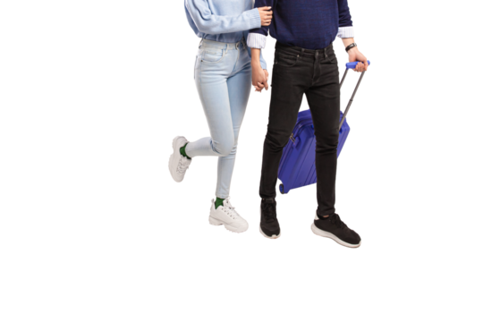 Male and female traveler holding hands happily walking with blue suitcase with transparent background