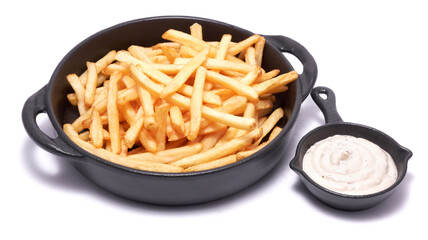 French fries potatoes in black ceramic bowl isolated on white background