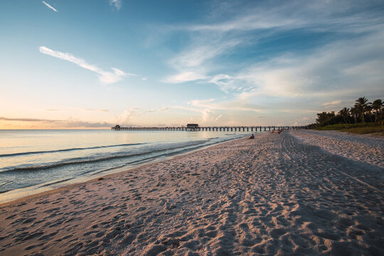 Naples Florida sunset over the Naples beach pier South West Florida summer
