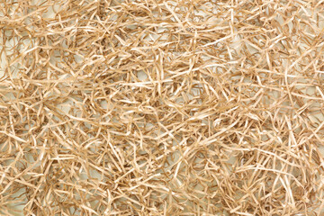 Christmas, holiday or new year golden background, shredded gold paper