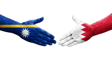 Handshake between Bahrain and Nauru flags painted on hands, isolated transparent image.
