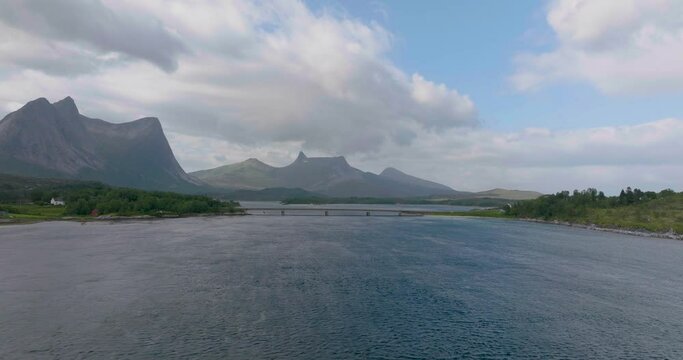 Scenic View Of Norwegian Fjord And Stortinden Mountain In Norway - aerial drone shot