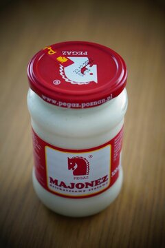 Polish Pegaz brand mayonnaise in a glass jar on a table.