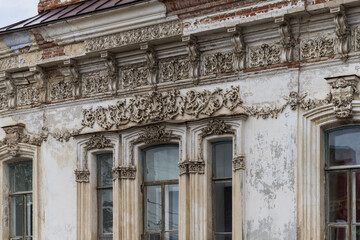 Fototapeta premium Detail of the facade of old house of the merchant Gribushin (Kungur, Ural, Russia)