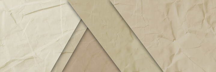 Creative background with scattered overlay of crumpled papers.