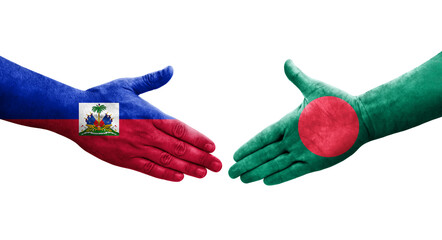 Handshake between Bangladesh and Haiti flags painted on hands, isolated transparent image.