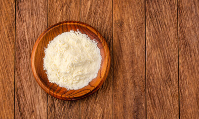 Fototapeta na wymiar Powdered milk with nutrients in the bowl