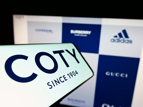 Stuttgart, Germany - 10-03-2022: Mobile phone with logo of American beauty company Coty Inc. on screen in front of business website. Focus on center-right of phone display.